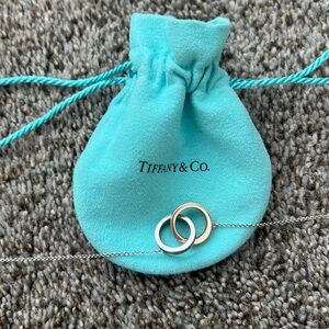Tiffany’s necklace  and ring. Ring is size 6.5. Ring has slight